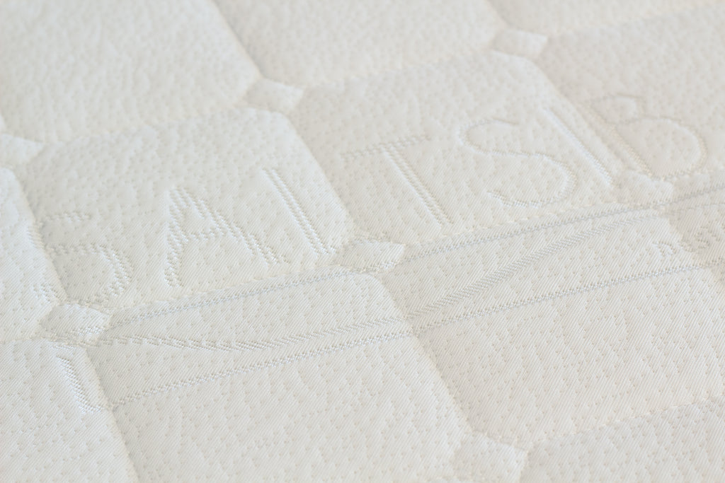 Close-up of a textured white fabric surface