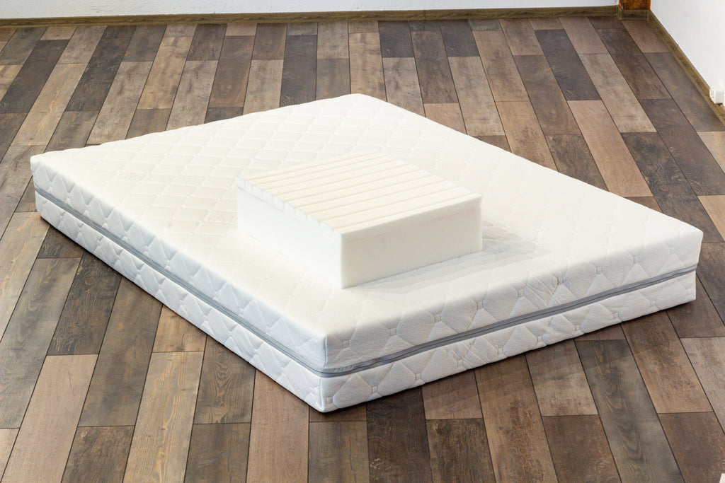Mattress on a wooden floor