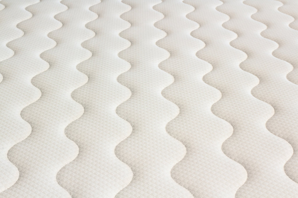 Close-up of a mattress with wavy pattern