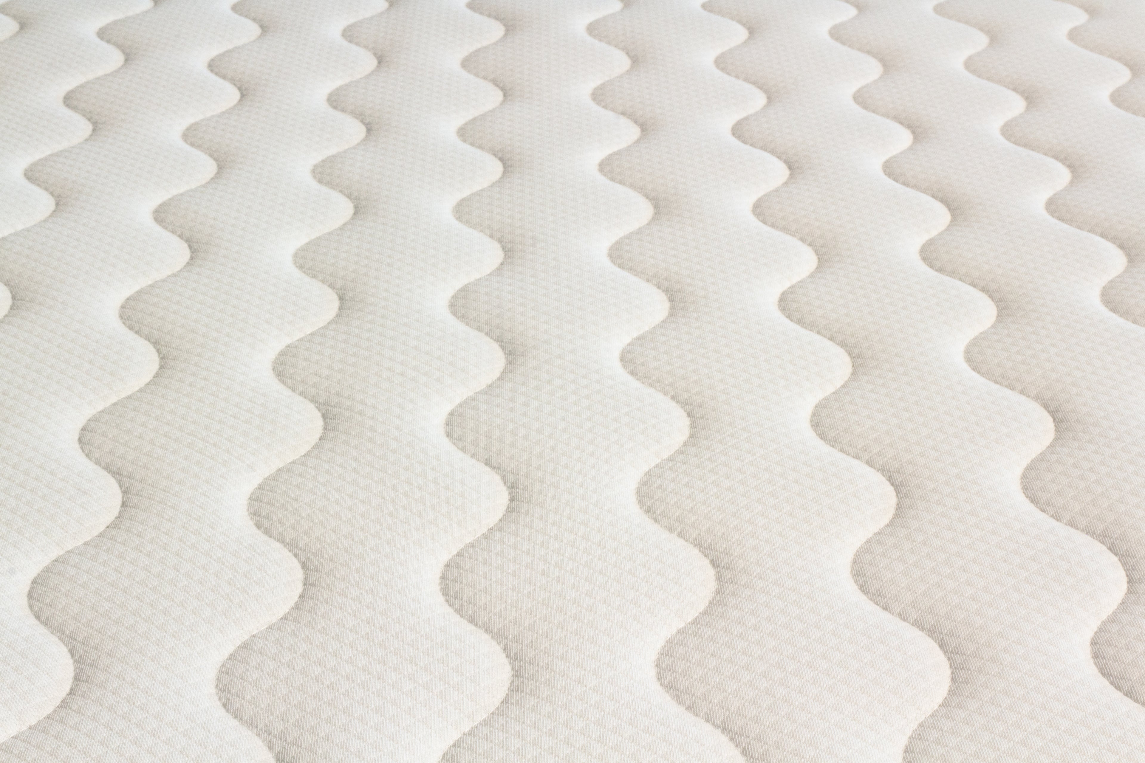 Close-up of a mattress with wavy pattern