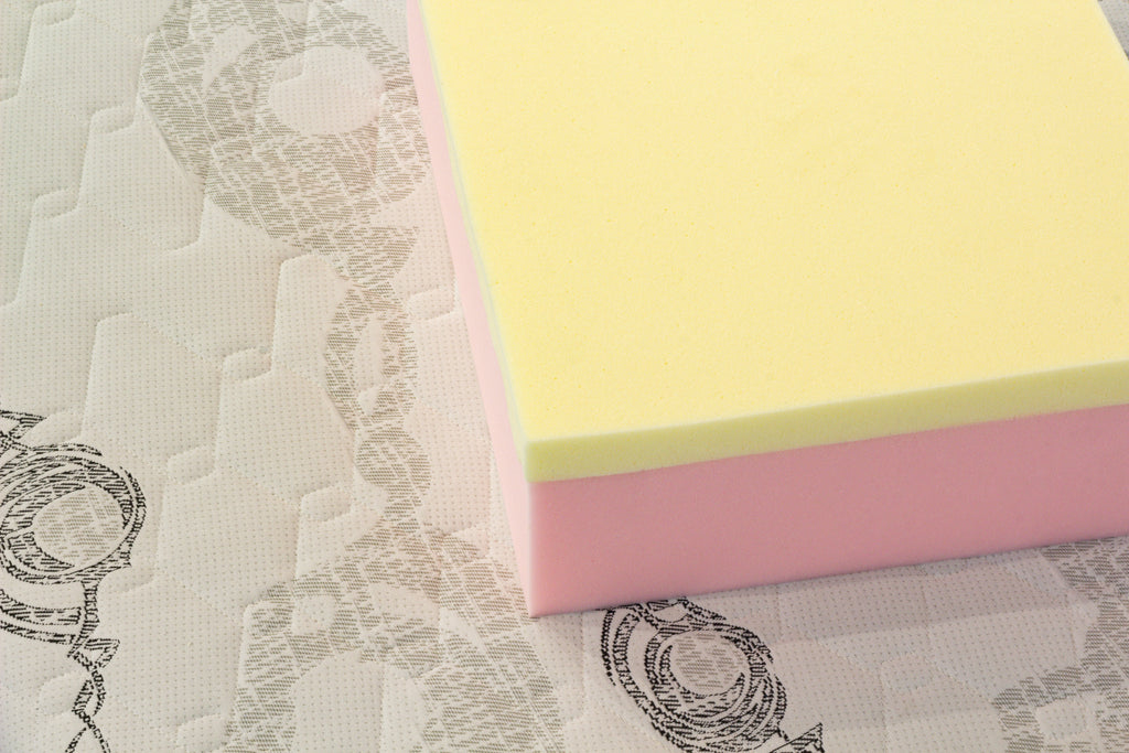 Stack of colorful foam on a matress