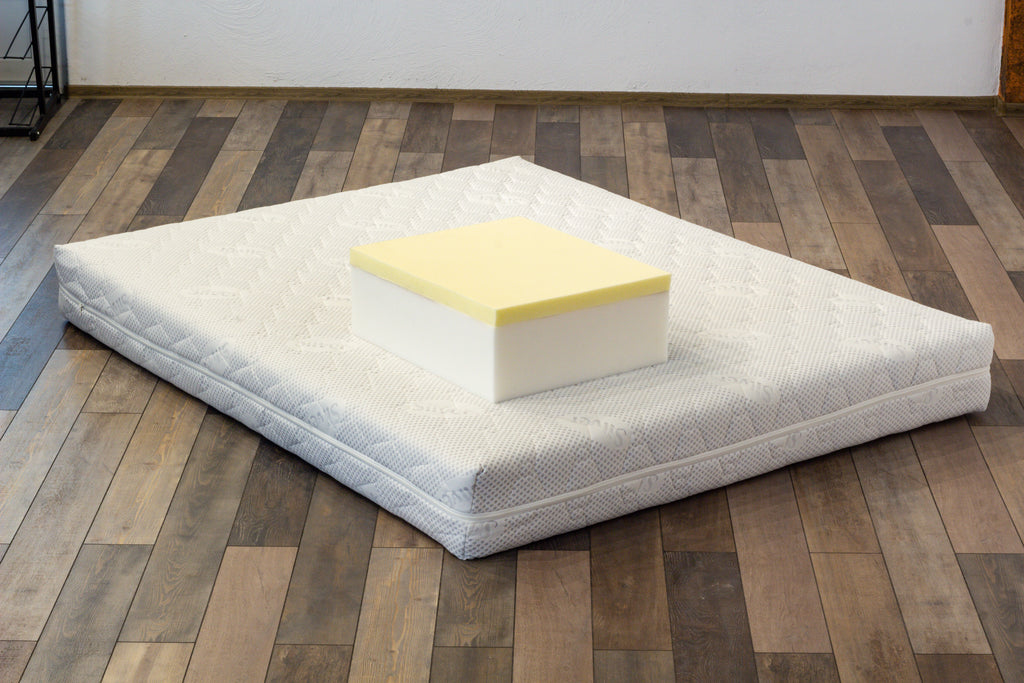 Mattress sample on a mattress in a room with wooden flooring