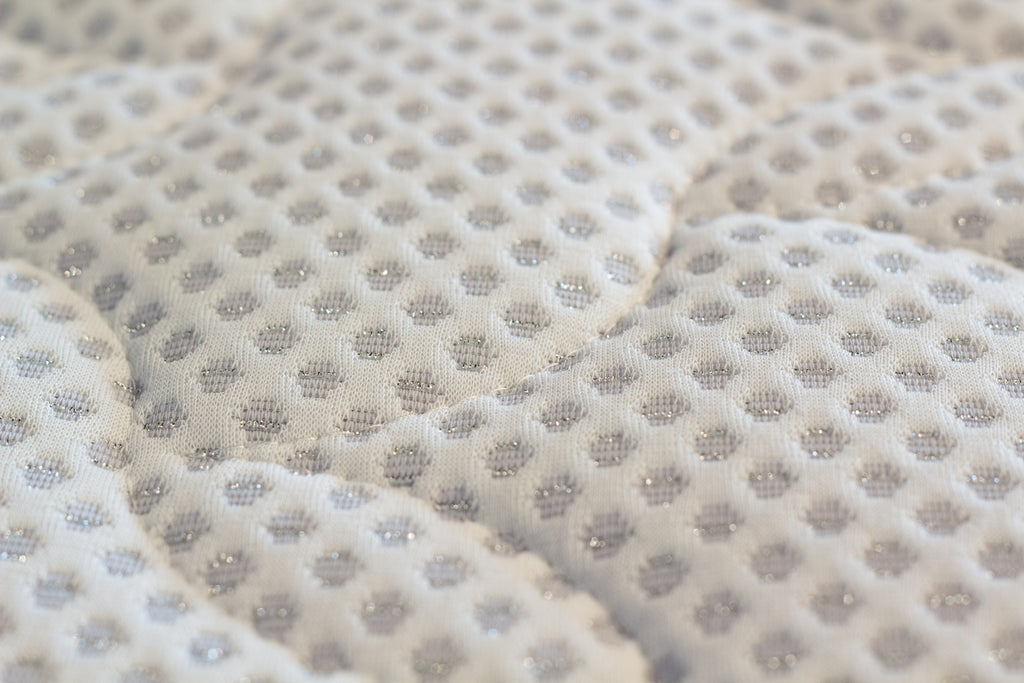 Close-up of a textured fabric with a subtle pattern