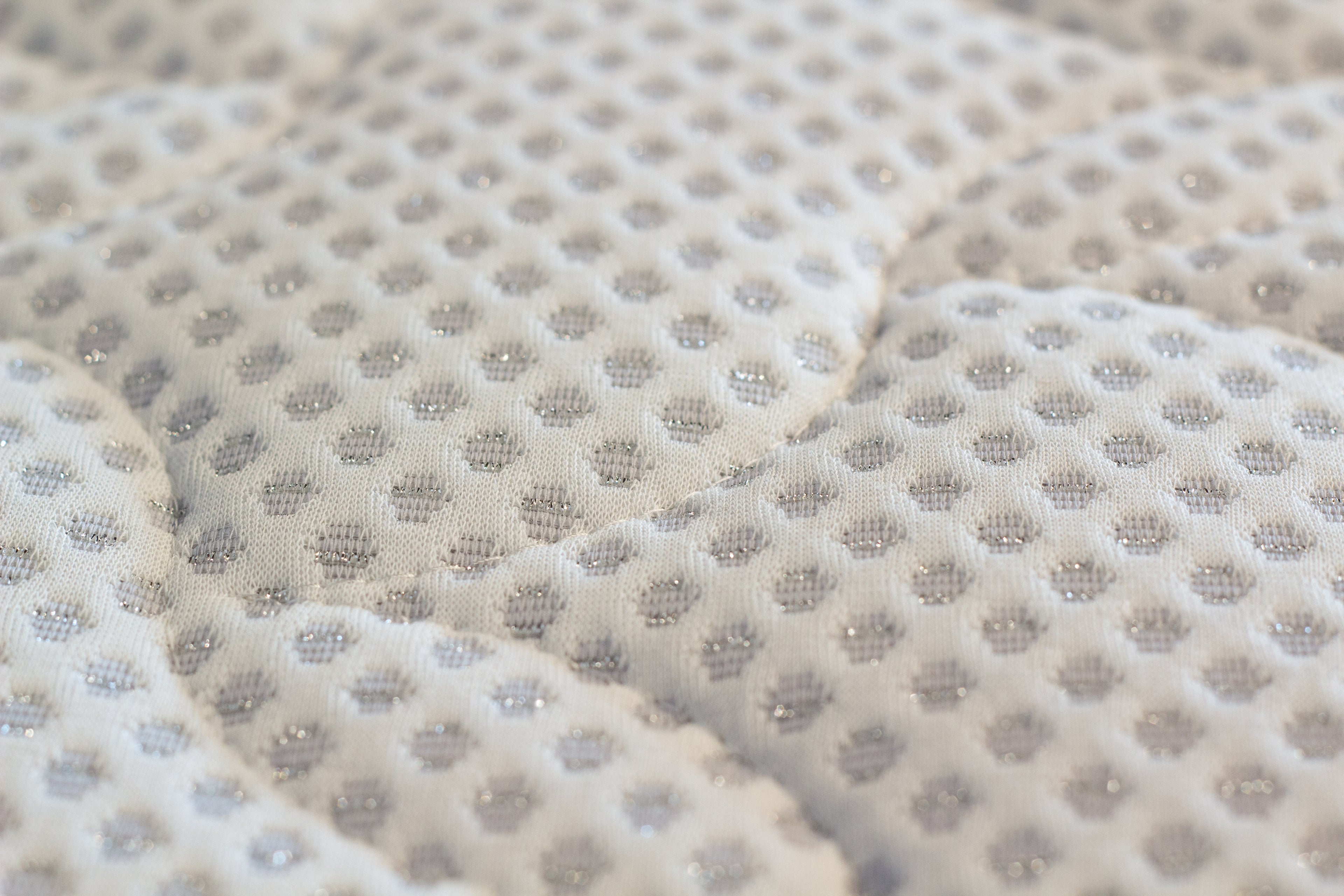 Close-up of a textured fabric with a subtle pattern