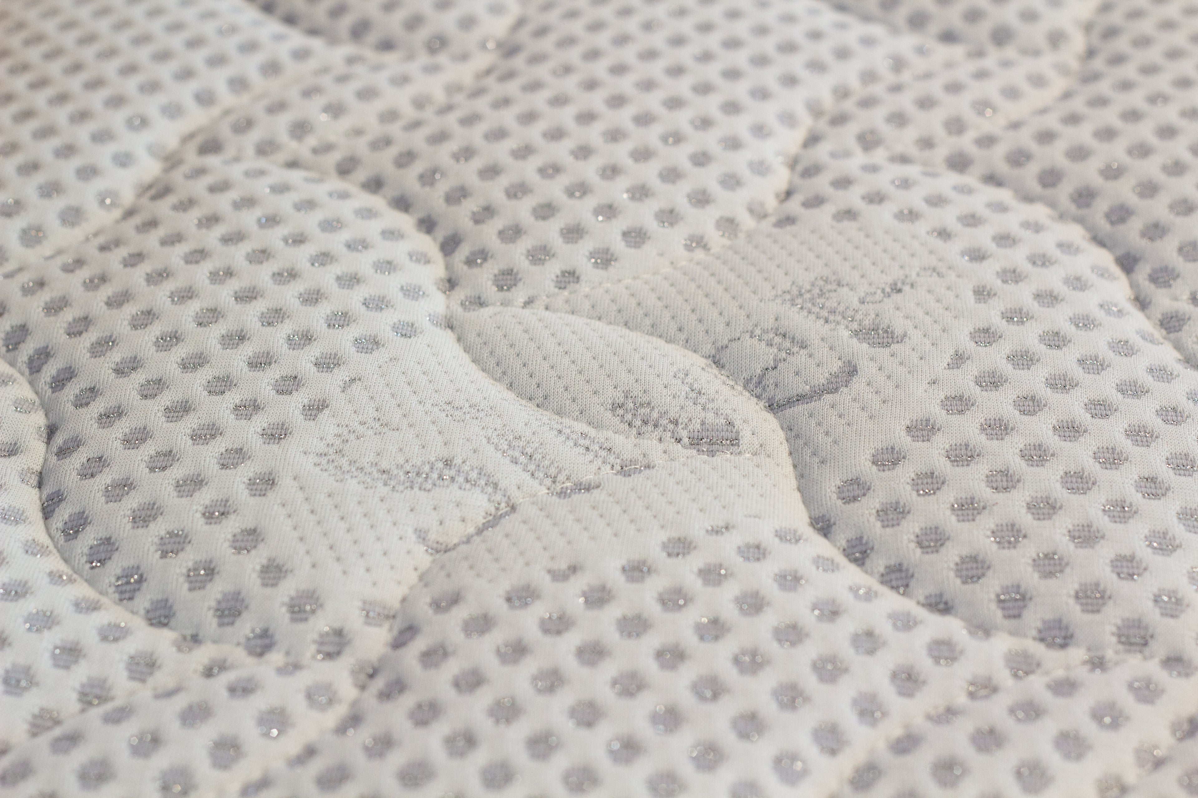 Close-up of a textured gray fabric surface