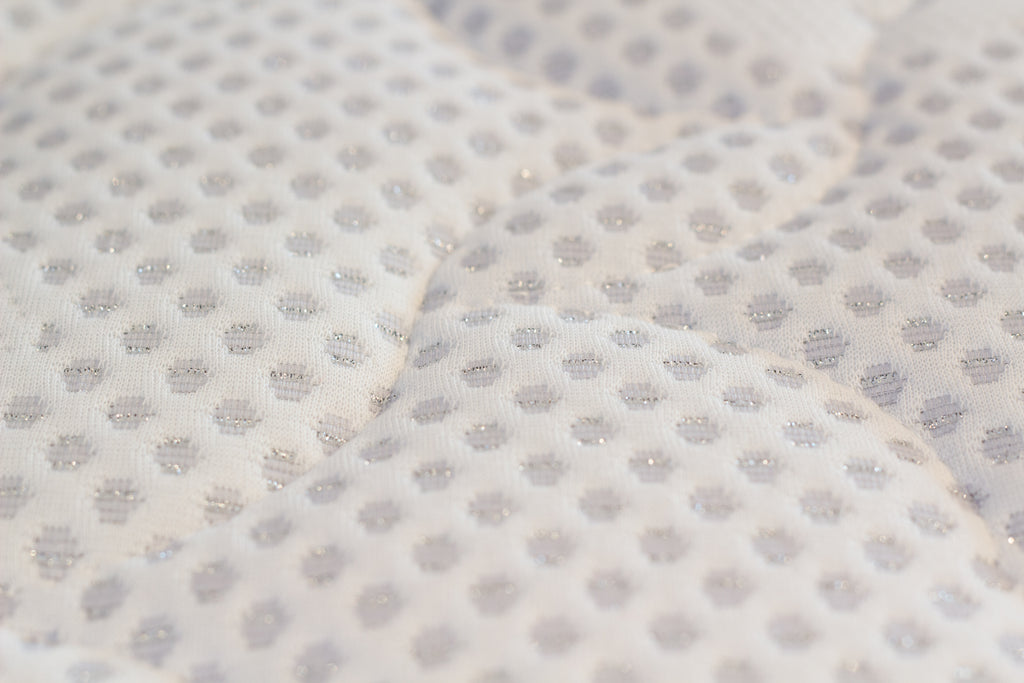 Close-up of textured fabric with a subtle pattern
