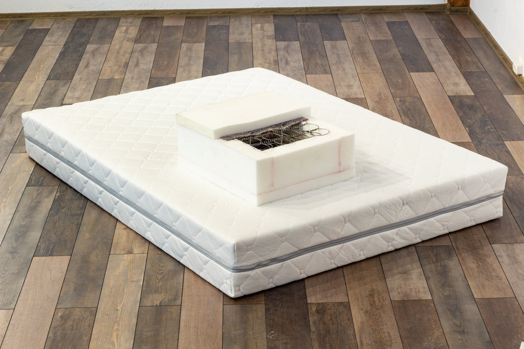Mattress on a wooden floor